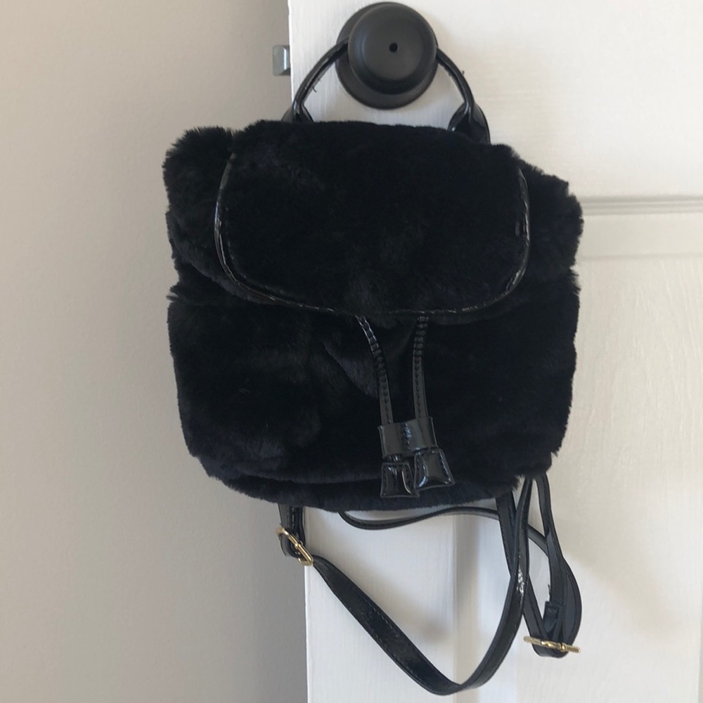 Steve Madden mini back pack.